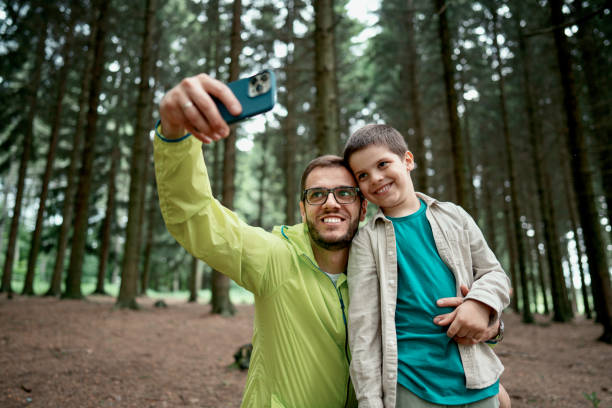 istock Beautiful father and son taking a selfie picture 1497289625