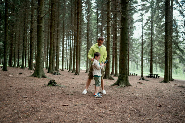 istock Father and son bonding in the nature 1497290425