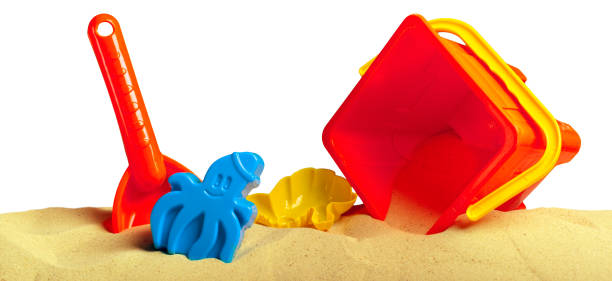 istock Plastic children toys on the sand beach 1497294459