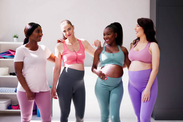 istock Pregnant Woman Group In Row 1497294562
