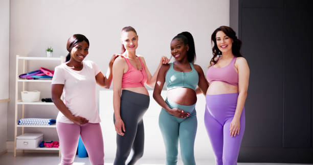 istock Pregnant Woman Group In Row 1497294565