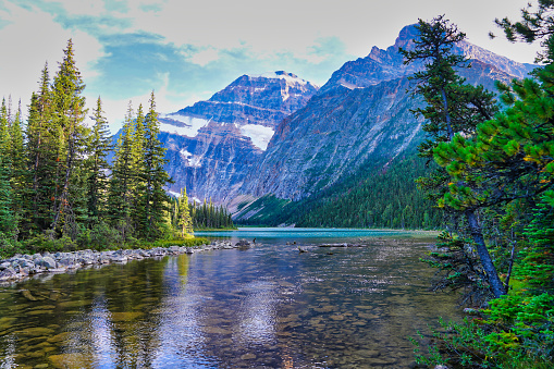 Cavell lake at the base of Mount Edith Cavell in the soft fading light of the evening near Jasper in the Canada rockies