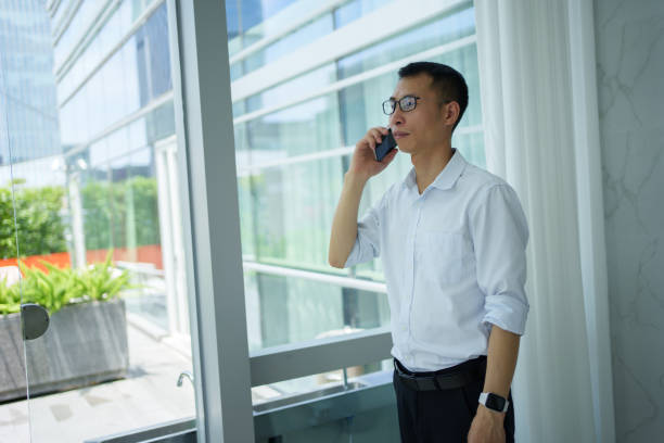 istock Asian man on the phone 1497297927