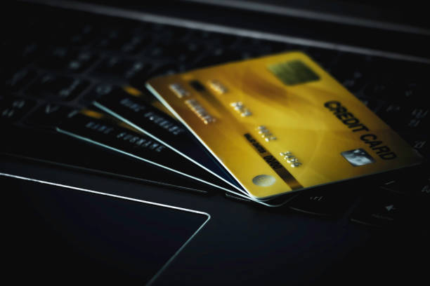 istock Close up credit card on keyboard, Selective focus. 1497307625