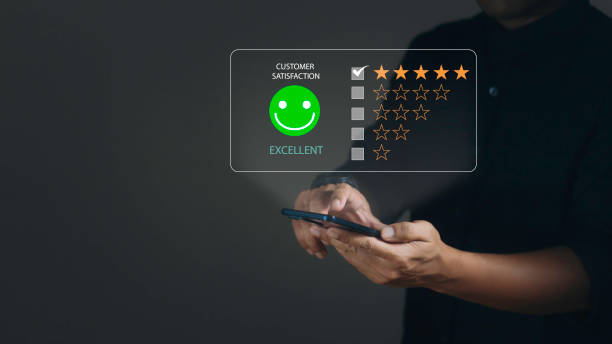 istock Customer review satisfaction feedback survey concept. User give rating to service experience on online application. 1497308453