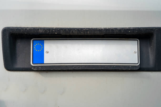 istock Empty european license plate on the back of a white van 1497327230