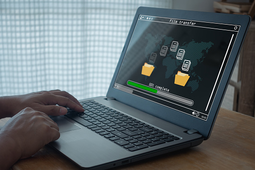 File Transfer Sample Loading Transfer Files Data System Relocation Concept Person Hand Using Laptop ...