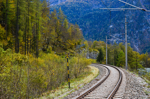 Empty railway tracks at sunny day in Hallstatt, Austria.
