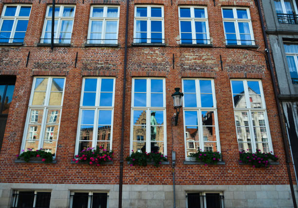 Ancient buildings in Bruges, Belgium. Bruges (Brugge) is a medieval fairy-tale town and Belgium most visited city with 7.8 million people every year.