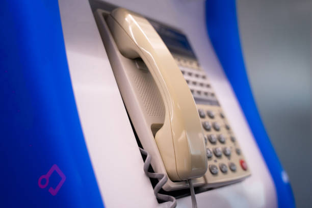 istock Public phone booths for emergency calls side view 1497332274