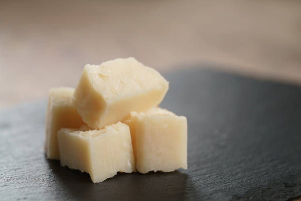 istock pieces of hard parmesan cheese on slate board 1497333140