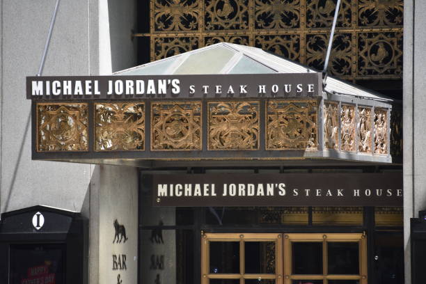 Michael Jordan's Steak House restaurant exterior logo sign on building in Downtown Chicago Chicago, IL, USA - June 9, 2023: Michael Jordan's Steak House restaurant exterior logo sign on building in Downtown Chicago nike air photos stock pictures, royalty-free photos & images