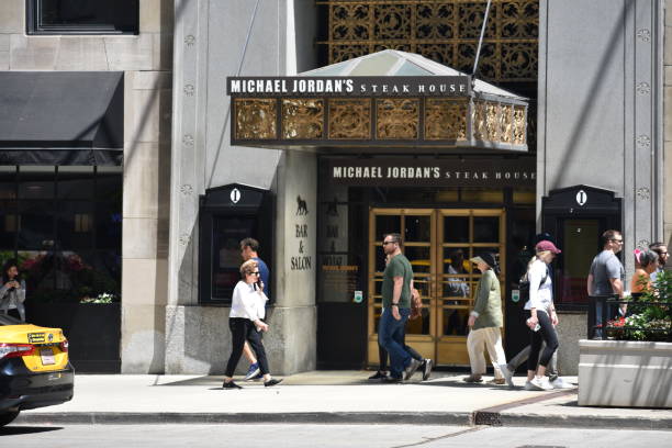 Michael Jordan's Steak House restaurant exterior logo sign on building in Downtown Chicago Chicago, IL, USA - June 9, 2023: Michael Jordan's Steak House restaurant exterior logo sign on building in Downtown Chicago nike air photos stock pictures, royalty-free photos & images