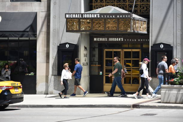 Michael Jordan's Steak House restaurant exterior logo sign on building in Downtown Chicago Chicago, IL, USA - June 9, 2023: Michael Jordan's Steak House restaurant exterior logo sign on building in Downtown Chicago nike air photos stock pictures, royalty-free photos & images