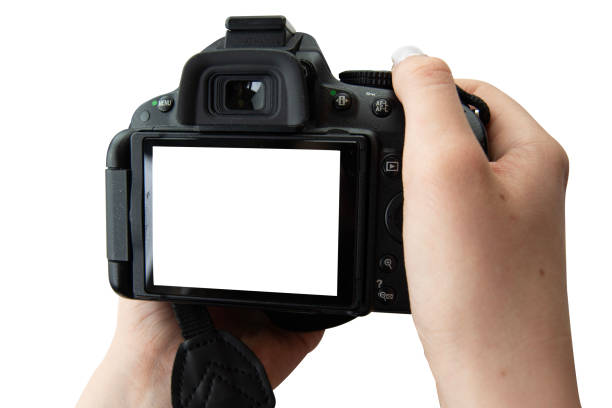 istock Isolated image of hands holding digital camera. Clipping path. Isolated background. 1497347400