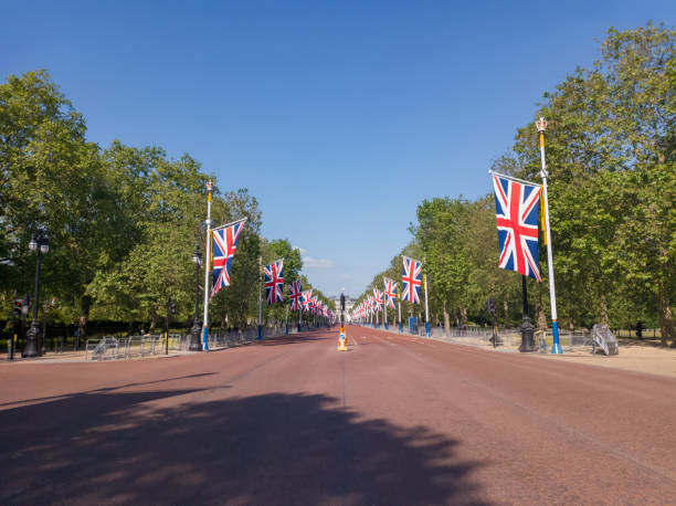 istock Union flags on display along The Mall in London, UK 1497348095