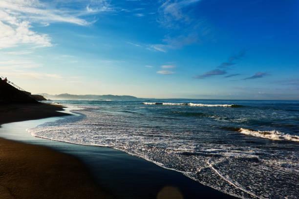 istock Scenic view of beach during sunrise 1497350368