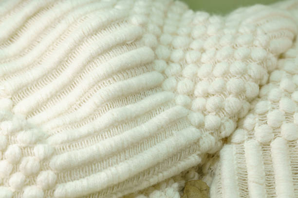 gestrickter wollstoffbeschaffenheitshintergrund - cashmere texture stock-fotos und bilder