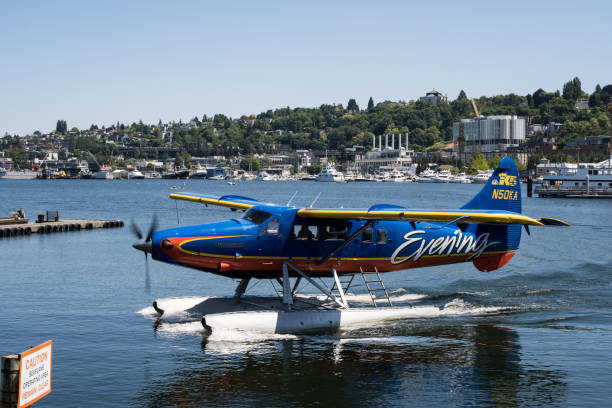 Seattle, USA - Jun 3, 2023: Late in the day a Kenmore Seaplane coming in to dock.