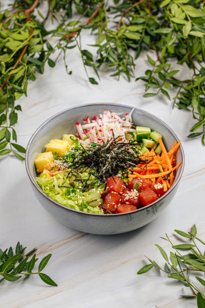 istock Portion of tuna poke bowl with vegetables 1497353621