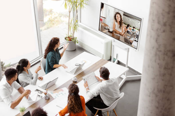 Company Employees Having Online Business Conference Video Call stock photo