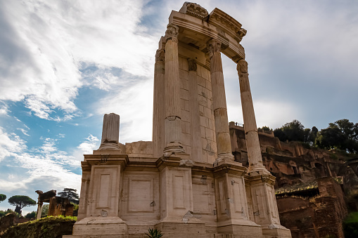 Panoramic close up view on the House of Vestal Virgins in the Roman Forum (Foro Romano) in the city of Rome, Lazio, Italy, EU Europe. Ancient ruins of the Roman Temple on Via Sacra. Culture trip