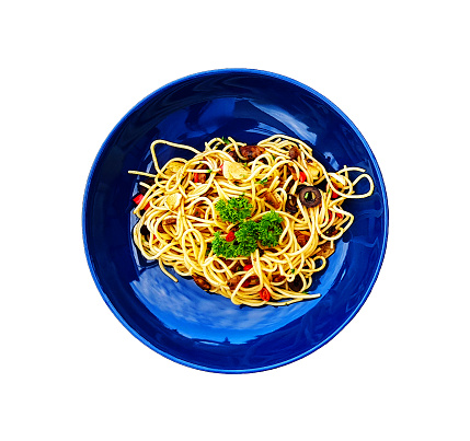 Flat lay or top view spaghetti with clams and mushroom sliced or Italian seafood pasta and parsley on top in blue dish or plate isolated on white background with clipping path and make selection.