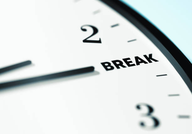 istock Break Time. The time on the wall clock is showing Break. 1497371066