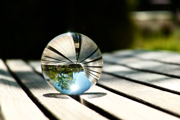 istock Crystal ball on wooden bench 1497379381
