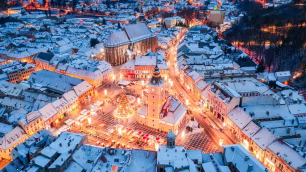 Photo of Brasov, Romania - Transylvania winter scenic landscape with Christmas Market in Main Square