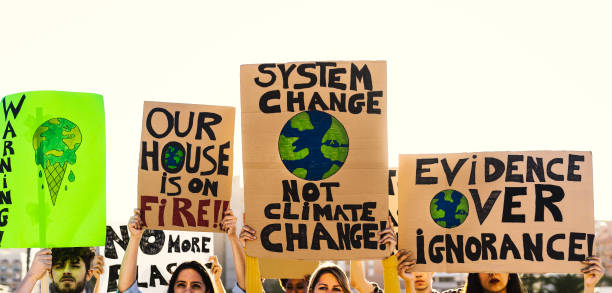 istock Group of activists protesting for climate crisis - Global warming concept 1497387081
