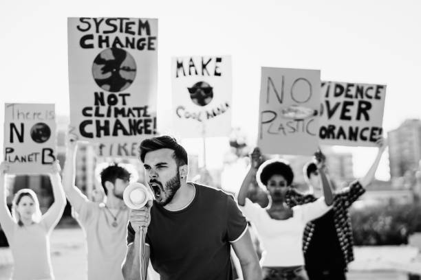 istock Group of young activists protesting for climate change - Global warming concept 1497387164