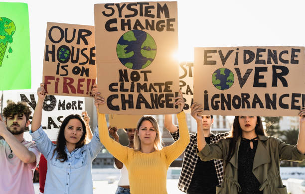 istock Group of young and diverse activists protesting for climate change - Global warming concept 1497387253