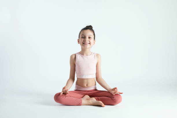 istock Cute Girl Doing Yoga 1497392113
