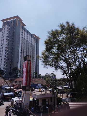 Bandung, Indonesia - January 14, 2023: Architectural landscape view of apartment building