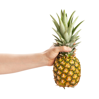 pineapple in hand path isolated on white