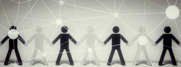 istock Silhouette illustration of people holding hands 1497400028