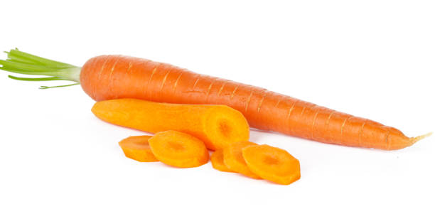 istock Sliced fresh carrots isolated on white background 1497400447
