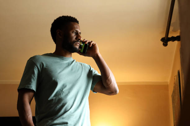 istock Black man talking on smartphone. 1497402125