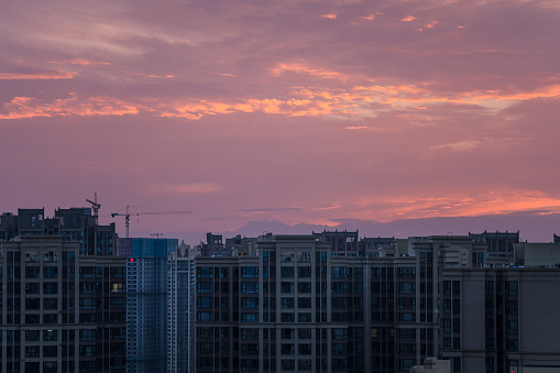 The sun sets over the city of Chengdu.