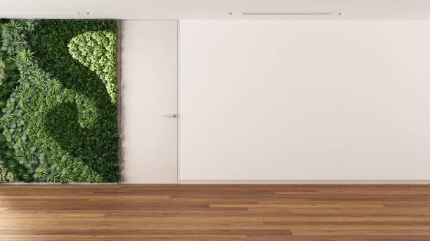 istock Empty room interior design, open space with vertical garden, parquet floor, white walls and minimal door, copy space, modern contemporary architecture concept idea 1497405799