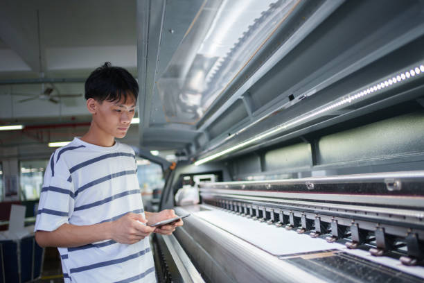 istock Workers inspecting machinery and equipment 1497423075