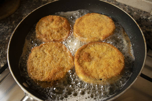 istock frying in pan of eggplants in carriage 1497430273