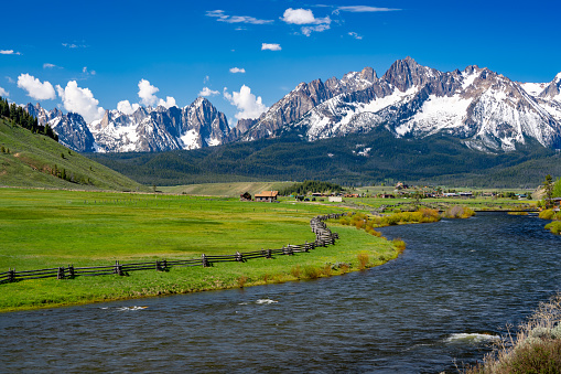 The little town of Stanley Idaho and the Sawtooth Mountains as seen from the Salmon River.