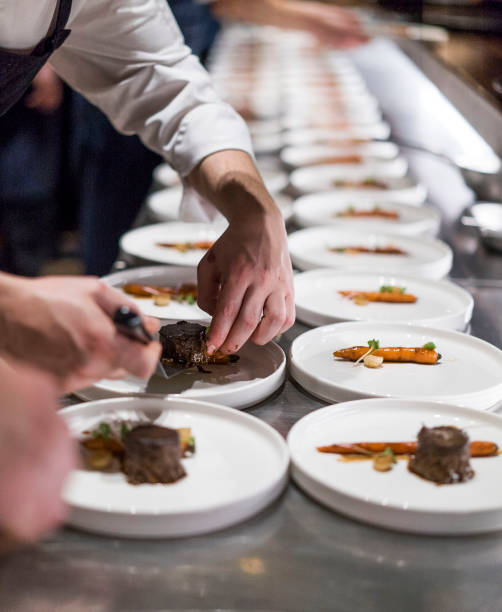 istock Chef prepares a minimal salad plate made with carrots 1497432209