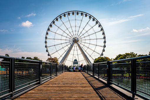 Montreal, Canada - August 29, 2022: bridge to the entrance of the ferris wheel