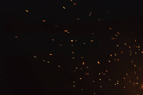 istock bonfire spark in the dark sky in night 1497435867
