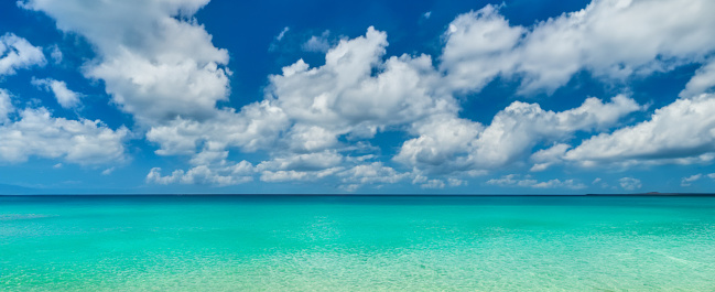 Stunning beautiful sea landscape beach with turquoise water. Beautiful Sand beach with turquoise water. Beautiful tropical beach with blue sky and white clouds.