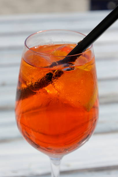 istock Cocktail with straw and ice in a glass 1497442695