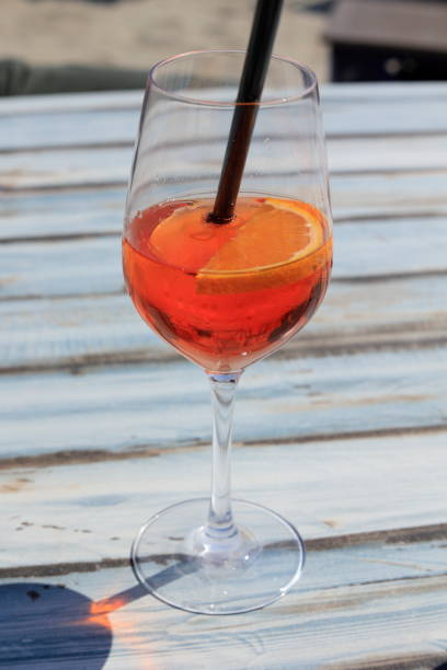 istock Cocktail with straw and ice in a glass 1497442701